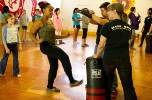 Kicking at girls' self-defense class